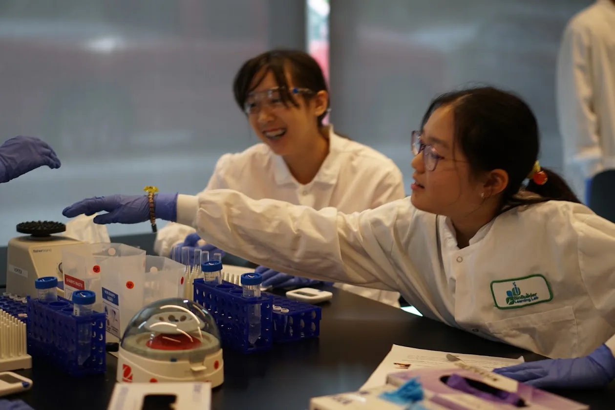 Two students working in the lab