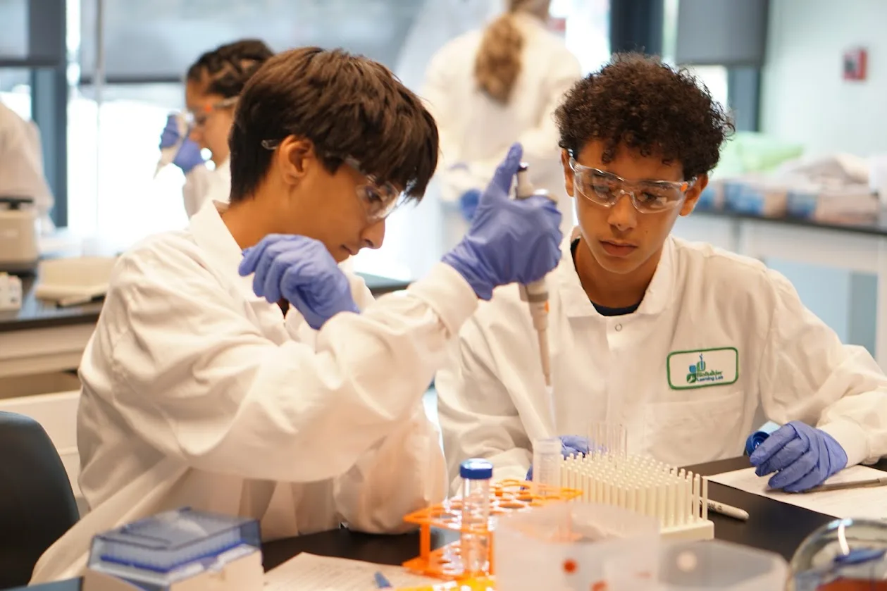 Two students working in the lab